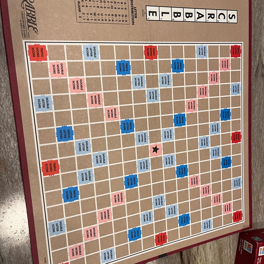 Hasbro Scrabble Board Game - Red, Blue, and Tan